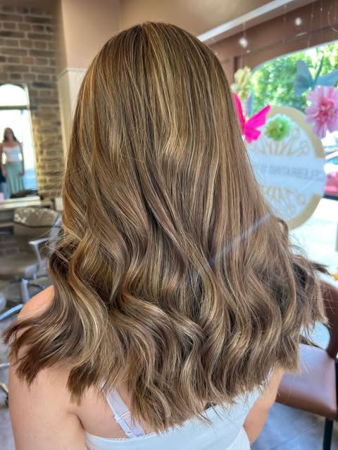 Long softly waved hair with blended colour at Bottega
